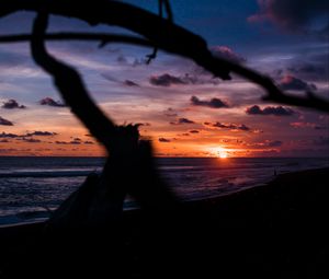 Preview wallpaper sunset, shore, clouds, sea