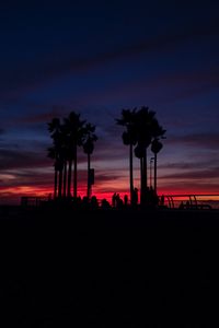 Preview wallpaper sunset, silhouettes, palm trees, people, tropics, sky