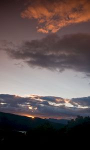 Preview wallpaper sunset, sky, clouds, dark, twilight, evening