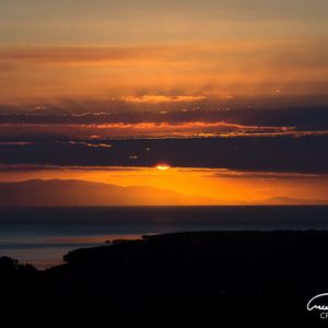 Preview wallpaper sunset, sky, clouds, horizon, sea, dark