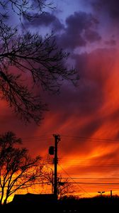 Preview wallpaper sunset, sky, clouds, silhouette, trees, wires, evening