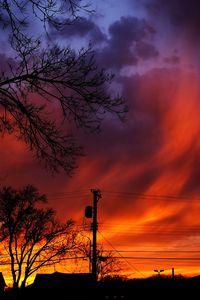 Preview wallpaper sunset, sky, clouds, silhouette, trees, wires, evening