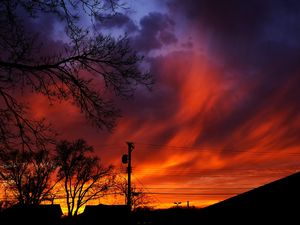 Preview wallpaper sunset, sky, clouds, silhouette, trees, wires, evening