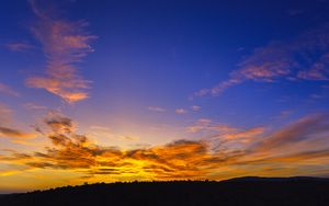 Preview wallpaper sunset, sky, clouds, trees, silhouette