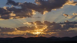 Preview wallpaper sunset, sky, hills, clouds