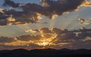 Preview wallpaper sunset, sky, hills, clouds