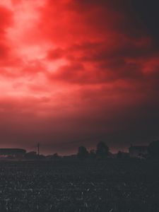 Preview wallpaper sunset, sky, horizon, field, clouds, red