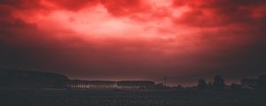 Preview wallpaper sunset, sky, horizon, field, clouds, red