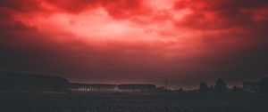 Preview wallpaper sunset, sky, horizon, field, clouds, red