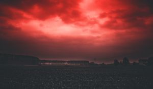 Preview wallpaper sunset, sky, horizon, field, clouds, red