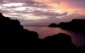 Preview wallpaper sunset, sky, rocks, dark