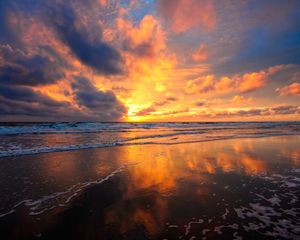 Preview wallpaper sunset, sky, sea, clouds, sand, wet, mirror, reflection