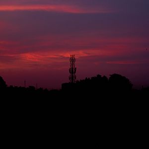 Preview wallpaper sunset, sky, tower, construction