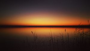 Preview wallpaper sunset, skyline, lake, grass