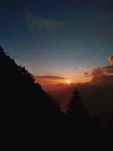 Preview wallpaper sunset, slope, fog, forest
