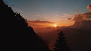 Preview wallpaper sunset, slope, fog, forest