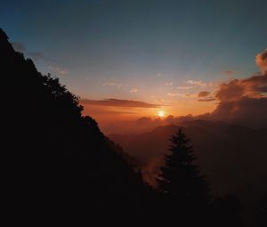 Preview wallpaper sunset, slope, fog, forest