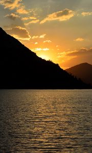 Preview wallpaper sunset, slope, sea, glare, sky