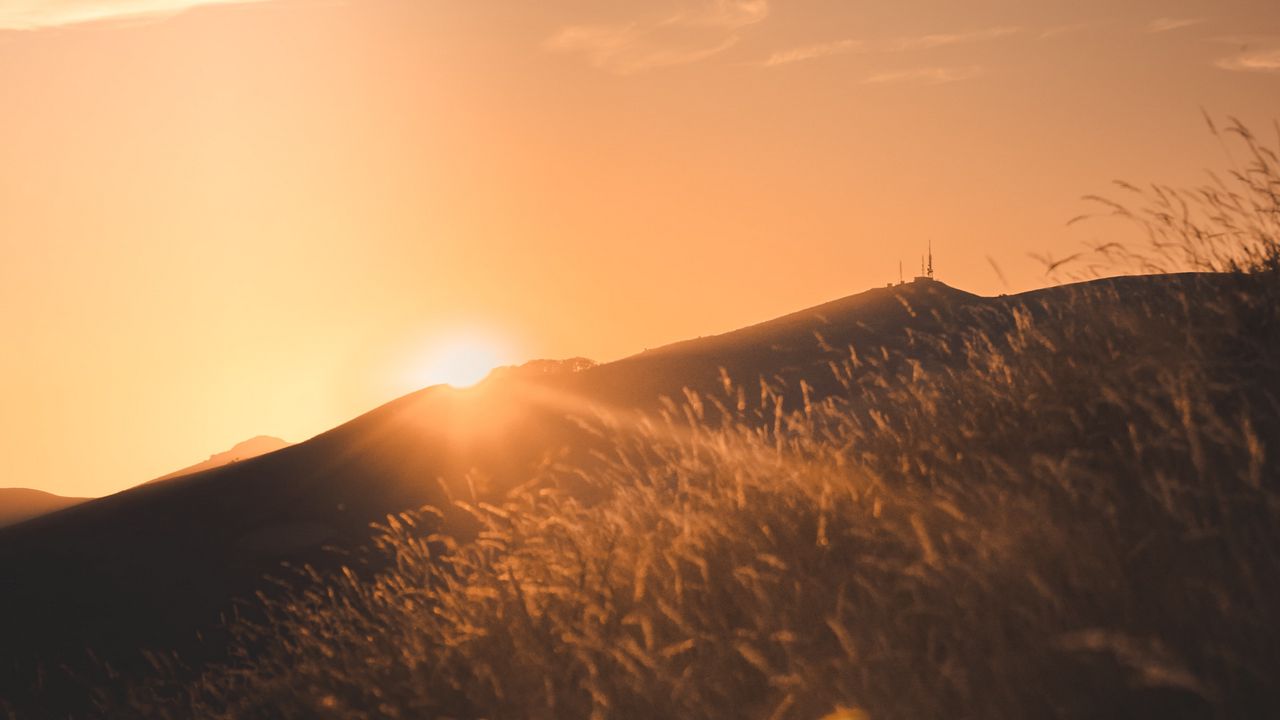 Wallpaper sunset, slope, sun, hill, rays