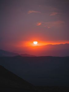 Preview wallpaper sunset, slope, sun, hills, sky