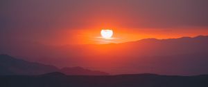 Preview wallpaper sunset, slope, sun, hills, sky