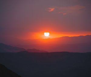 Preview wallpaper sunset, slope, sun, hills, sky