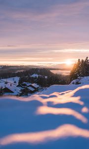 Preview wallpaper sunset, snow, houses, mountains, winter, landscape