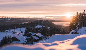 Preview wallpaper sunset, snow, houses, mountains, winter, landscape