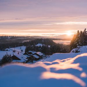 Preview wallpaper sunset, snow, houses, mountains, winter, landscape