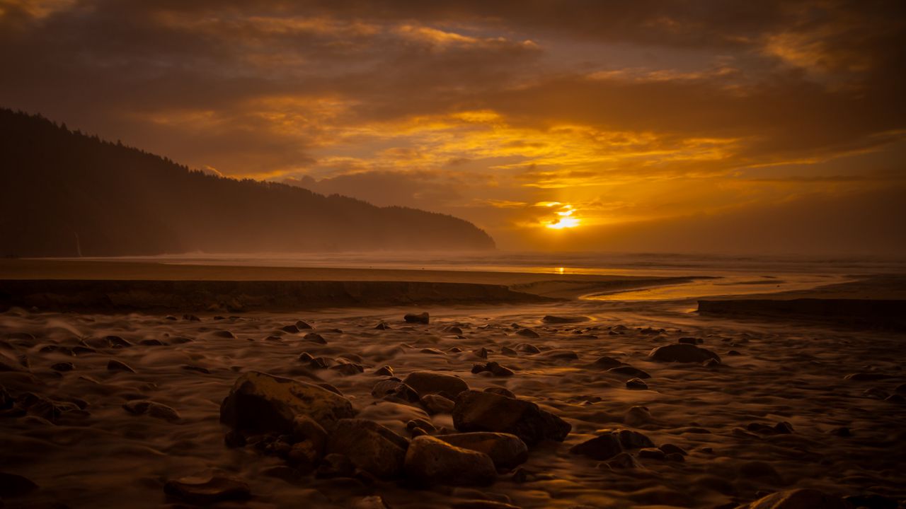 Wallpaper sunset, stone, water, waves