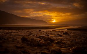 Preview wallpaper sunset, stone, water, waves