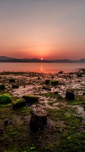 Preview wallpaper sunset, stones, mountains, horizon