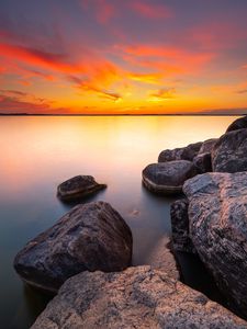 Preview wallpaper sunset, stones, rocks, horizon, sea