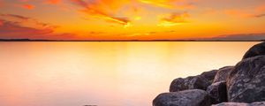 Preview wallpaper sunset, stones, rocks, horizon, sea
