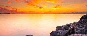 Preview wallpaper sunset, stones, rocks, horizon, sea