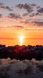 Preview wallpaper sunset, stones, sea, horizon, sky