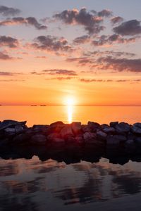 Preview wallpaper sunset, stones, sea, horizon, sky