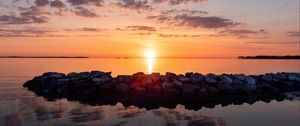 Preview wallpaper sunset, stones, sea, horizon, sky
