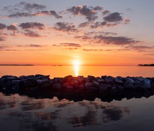 Preview wallpaper sunset, stones, sea, horizon, sky