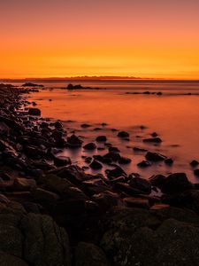 Preview wallpaper sunset, stones, water, horizon