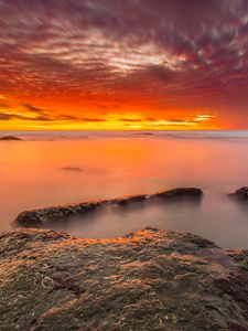 Preview wallpaper sunset, stones, water, horizon, sky