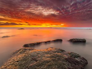 Preview wallpaper sunset, stones, water, horizon, sky