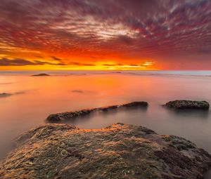 Preview wallpaper sunset, stones, water, horizon, sky