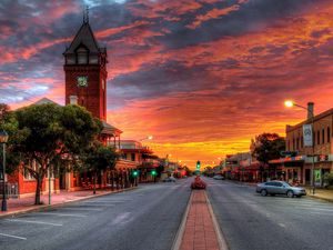 Preview wallpaper sunset, street, tower, colorful