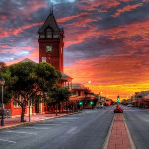 Preview wallpaper sunset, street, tower, colorful