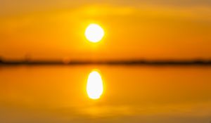 Preview wallpaper sunset, sun, beach, sand, water, reflection