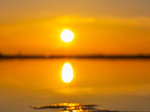 Preview wallpaper sunset, sun, beach, sand, water, reflection
