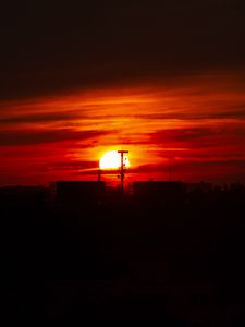 Preview wallpaper sunset, sun, buildings, city, sky