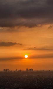 Preview wallpaper sunset, sun, city, sky
