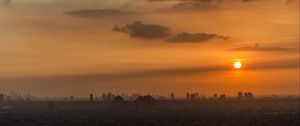 Preview wallpaper sunset, sun, city, sky